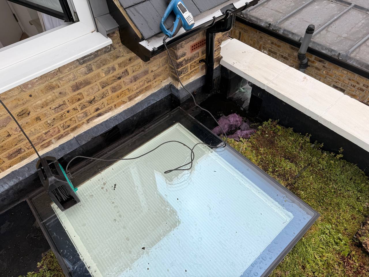 Rubber roofing Wandsworth London with green roof by The Specialist Roofers